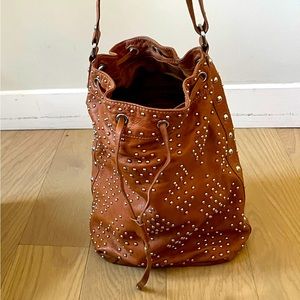 Sandro bucket bag with studs